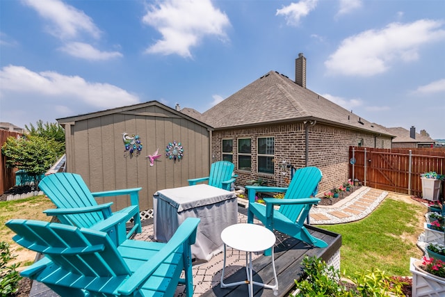 exterior space featuring a yard and a shed