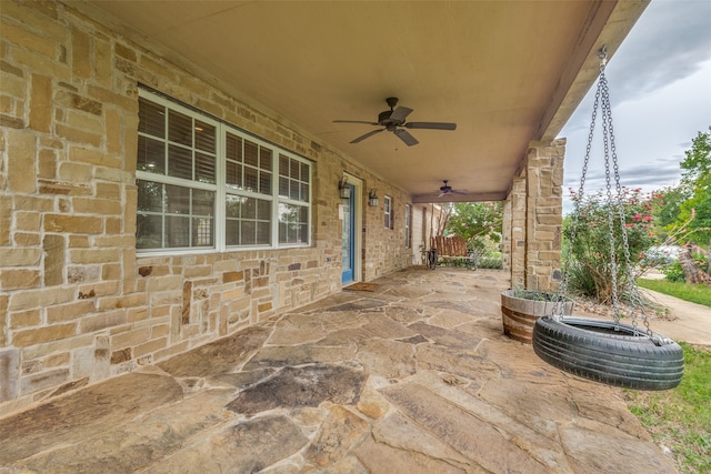 view of patio featuring ceiling fan