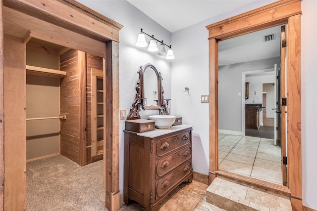 bathroom with tile floors and oversized vanity