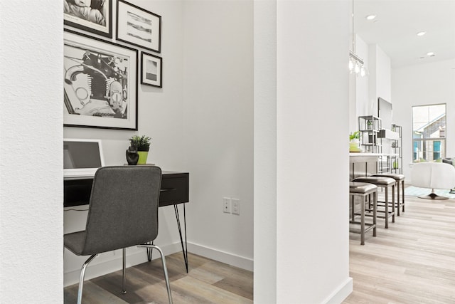 home office featuring light hardwood / wood-style floors