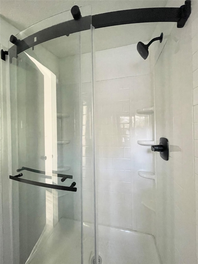 bathroom with walk in shower