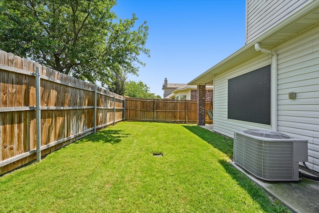 view of yard featuring central AC