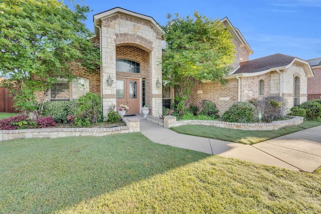 view of front of home with a front lawn