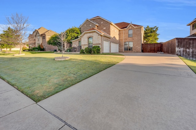 view of front facade featuring a front yard and a garage