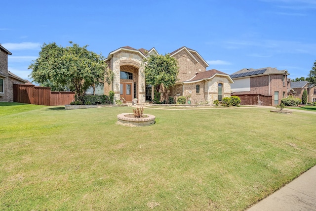 view of front facade featuring a front yard