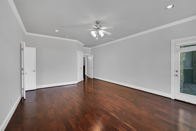 empty room with dark hardwood / wood-style flooring, ceiling fan, and ornamental molding