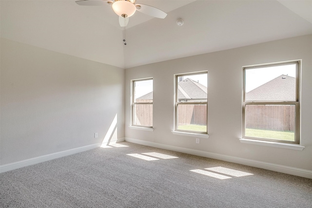 spare room with carpet floors and ceiling fan