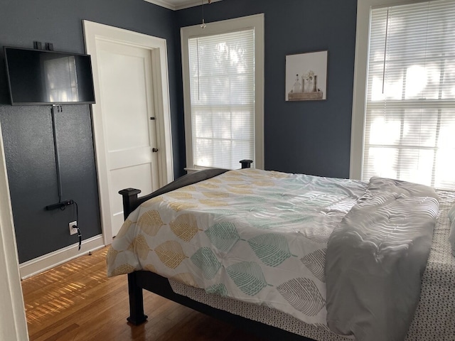 bedroom featuring hardwood / wood-style floors