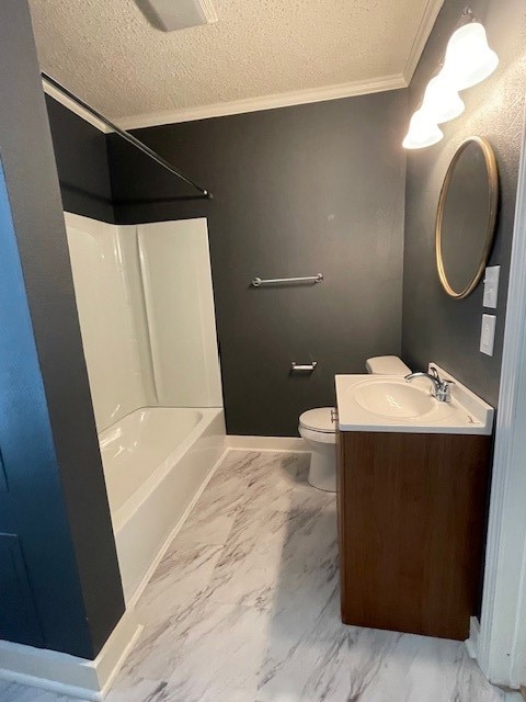 full bathroom featuring a textured ceiling, toilet, shower / tub combination, vanity, and ornamental molding