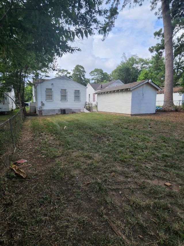 view of yard featuring central AC