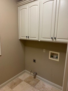 clothes washing area featuring cabinets, washer hookup, gas dryer hookup, and electric dryer hookup