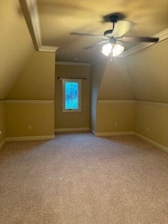 bonus room featuring light carpet, vaulted ceiling, and ceiling fan