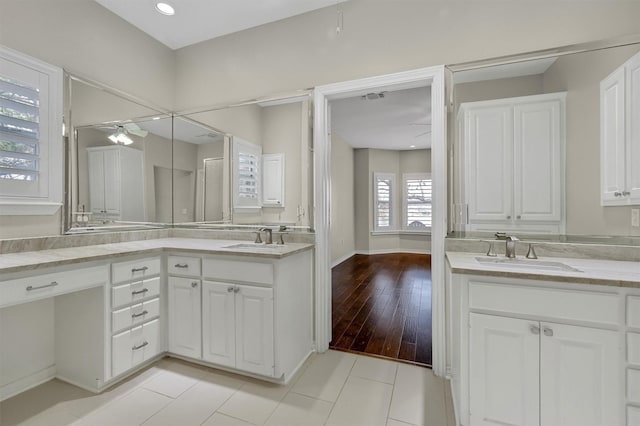 bathroom with vanity, tile patterned floors, and ceiling fan