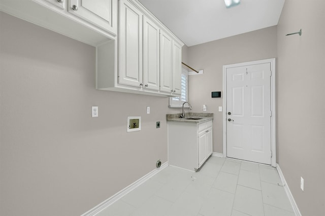 clothes washing area featuring hookup for a washing machine, electric dryer hookup, sink, and cabinets