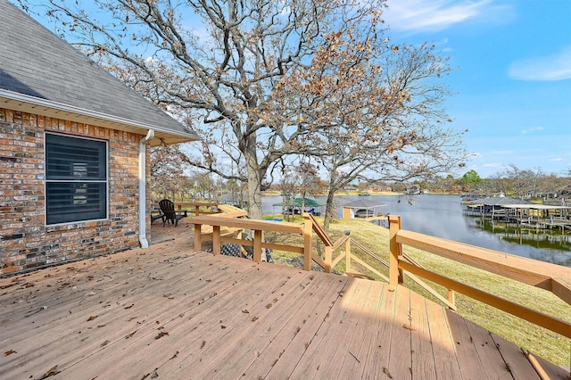 deck featuring a water view