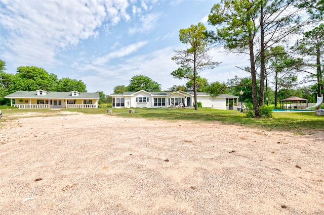 view of front of home with a gazebo