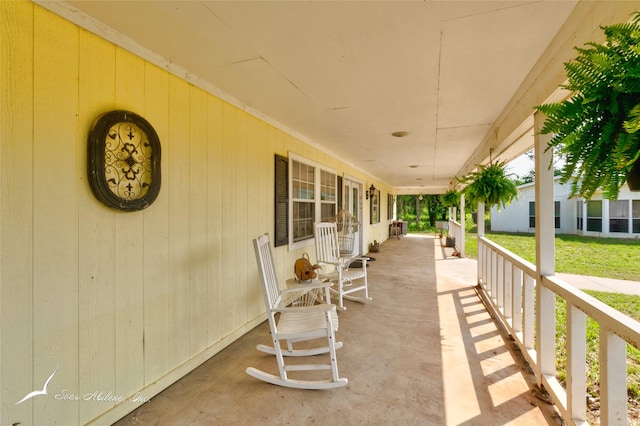 view of patio featuring a porch