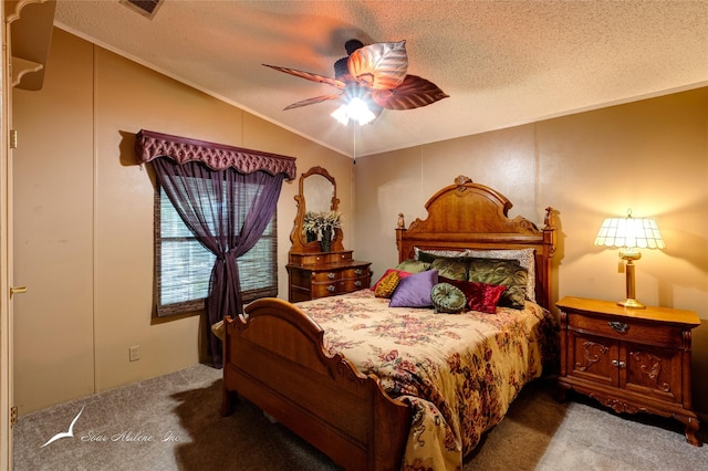 bedroom featuring ceiling fan, carpet flooring, vaulted ceiling, and a textured ceiling