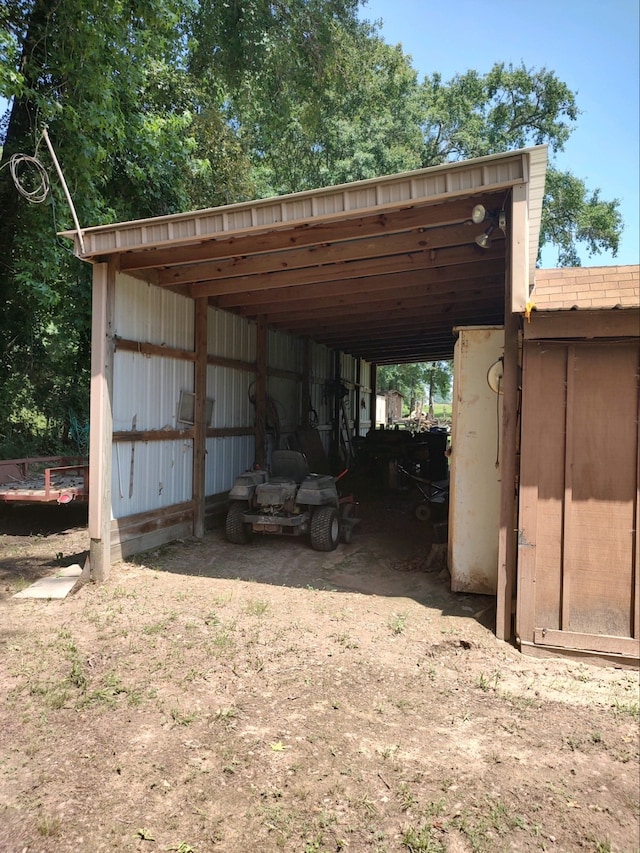 view of outdoor structure with a carport