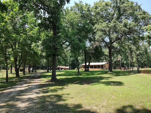 surrounding community featuring a lawn