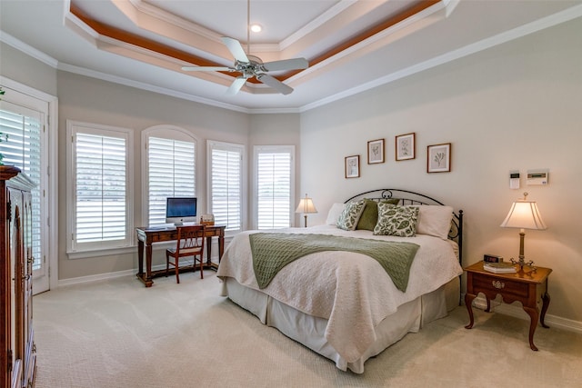 carpeted bedroom with multiple windows, ceiling fan, and crown molding