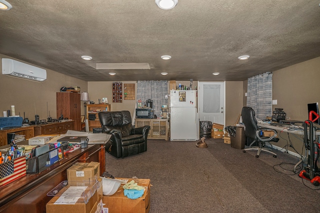 office area with a wall unit AC, a textured ceiling, and carpet floors