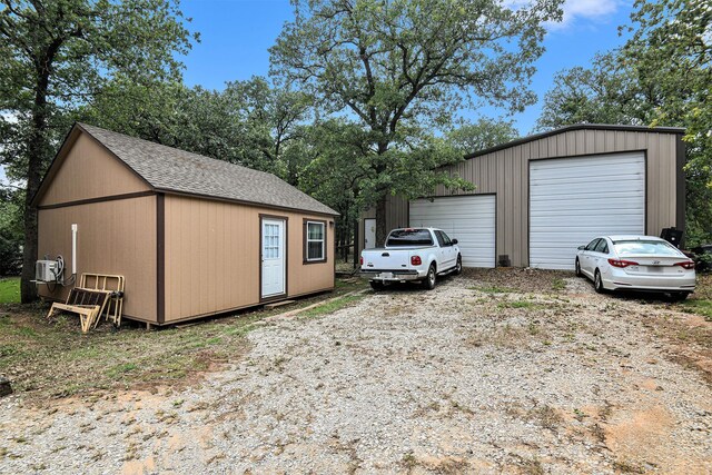 view of outbuilding featuring a garage