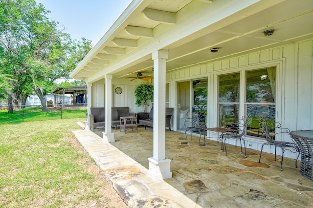 view of patio with an outdoor hangout area and ceiling fan