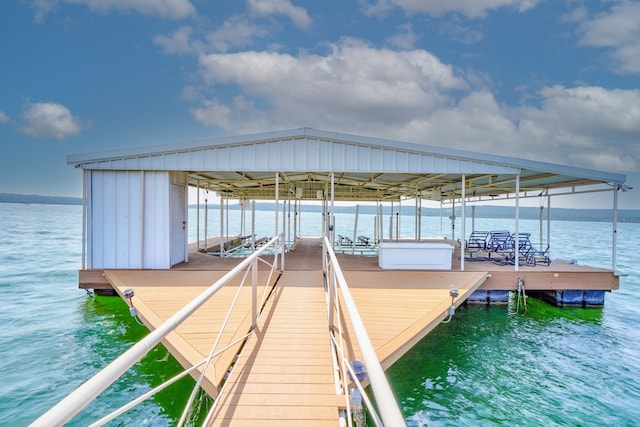 dock area featuring a water view