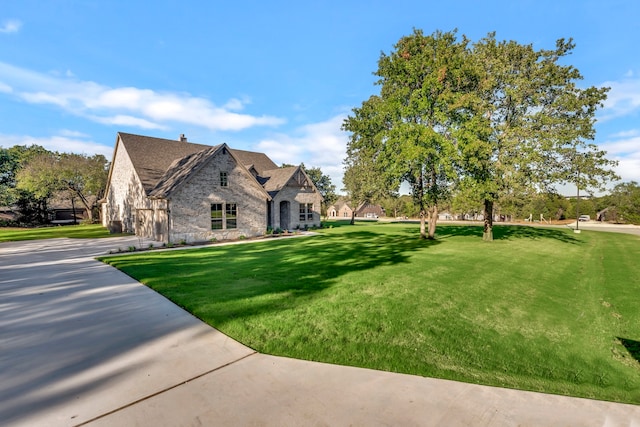 exterior space with a front yard