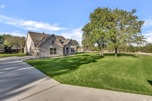 exterior space featuring a lawn