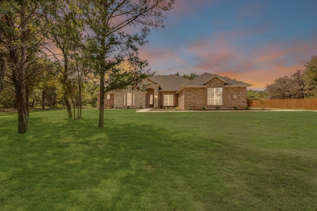 view of front facade with a lawn