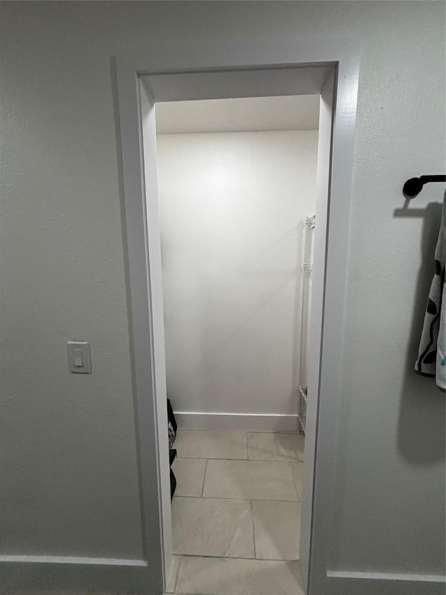 bathroom with tile patterned flooring