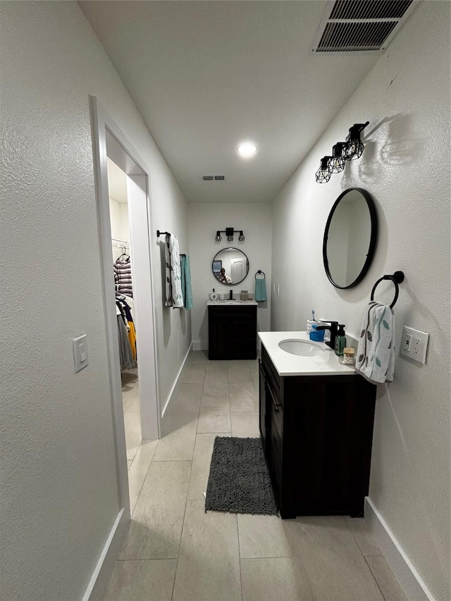 bathroom featuring vanity and tile patterned floors