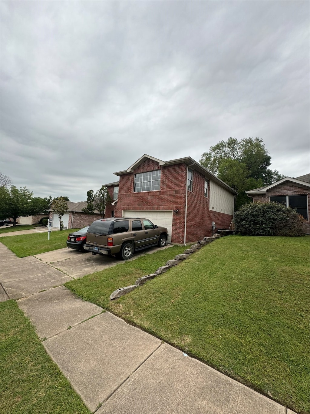 exterior space with a front lawn