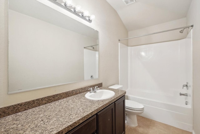 full bathroom featuring vanity, bathing tub / shower combination, tile patterned floors, and toilet