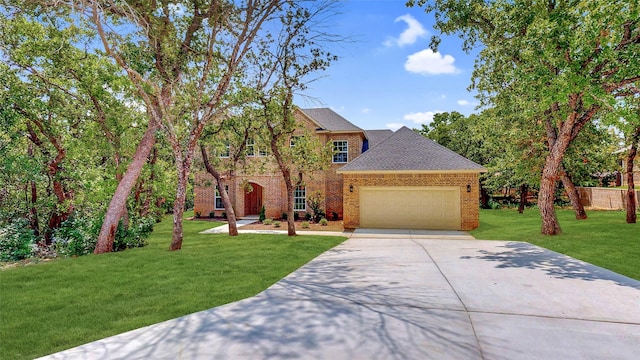 view of front facade featuring a garage and a front lawn