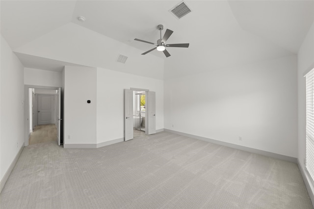 unfurnished bedroom featuring light carpet, high vaulted ceiling, and ceiling fan