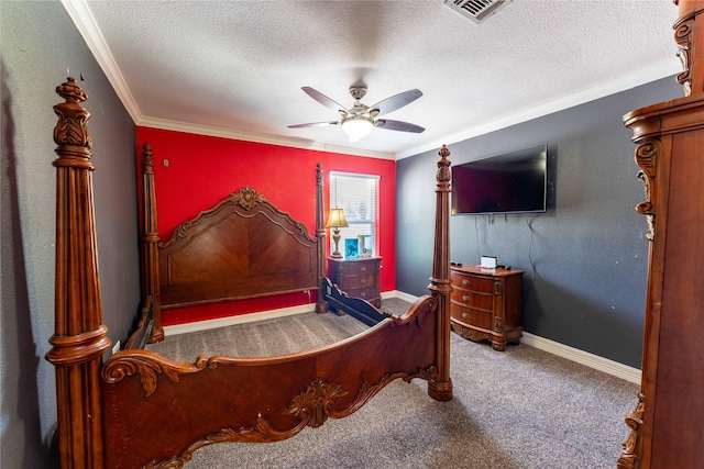 carpeted bedroom with ceiling fan, a textured ceiling, and ornamental molding