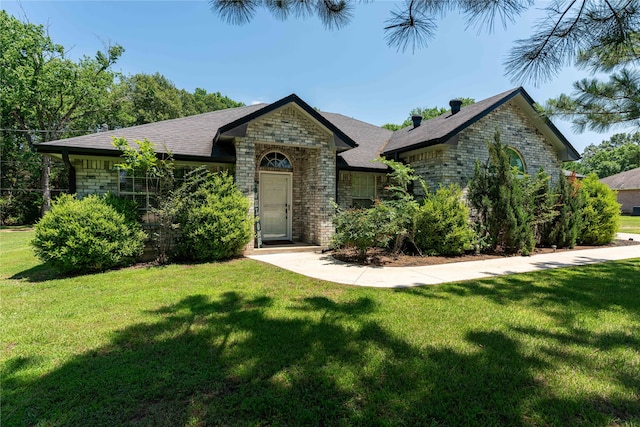 view of front of home with a front lawn