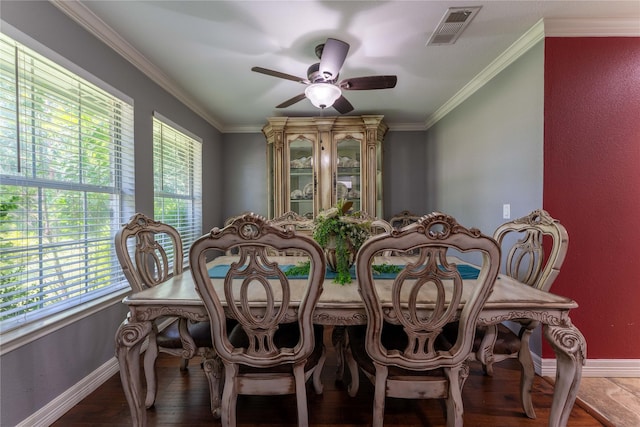 dining area featuring ceiling fan, ornamental molding, and wood-type flooring