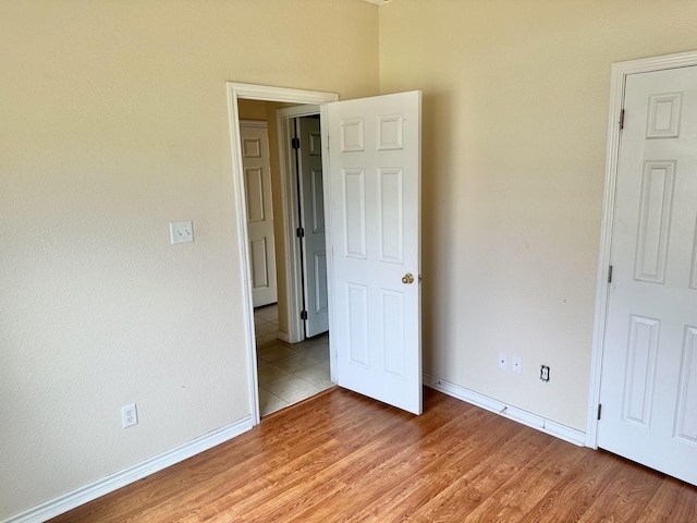 unfurnished bedroom with light hardwood / wood-style flooring