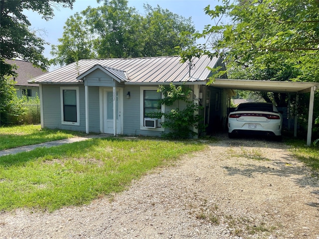 single story home with a carport