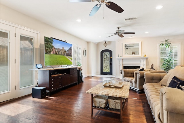 living room with dark hardwood / wood-style floors