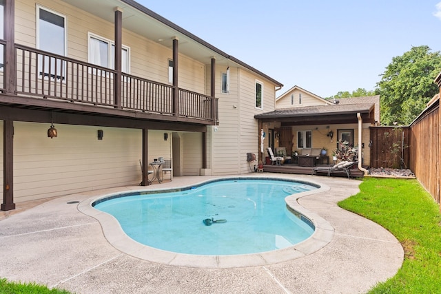 view of pool with an outdoor living space and a patio area