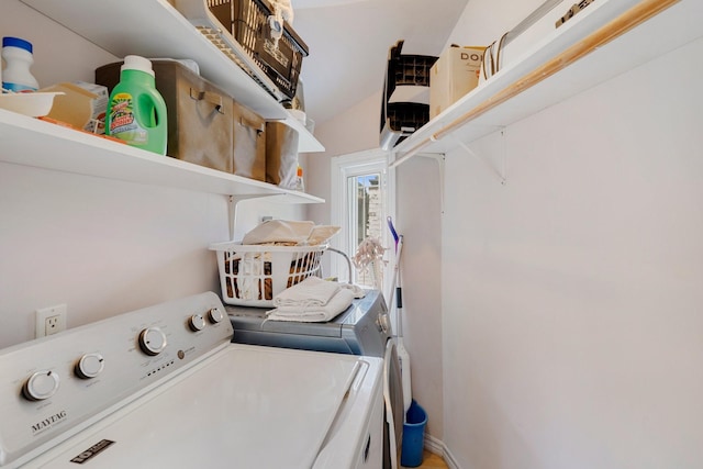 laundry room with washer and dryer