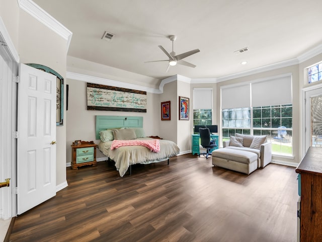 bedroom featuring ceiling fan, dark hardwood / wood-style flooring, crown molding, and multiple windows