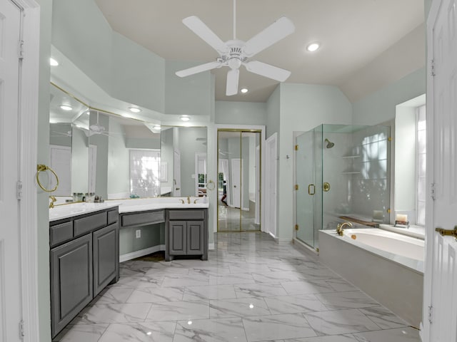 bathroom featuring vanity, separate shower and tub, lofted ceiling, and ceiling fan