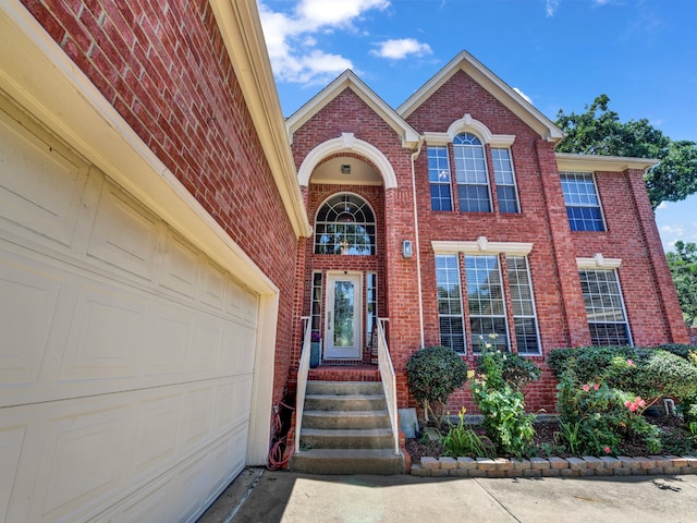 property entrance with a garage