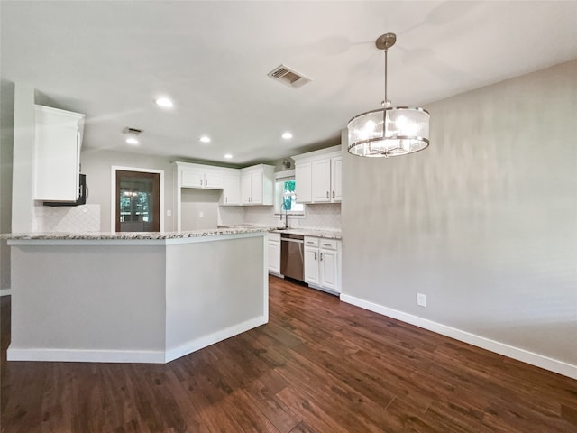 kitchen featuring hanging light fixtures, stainless steel dishwasher, dark hardwood / wood-style floors, a notable chandelier, and white cabinets